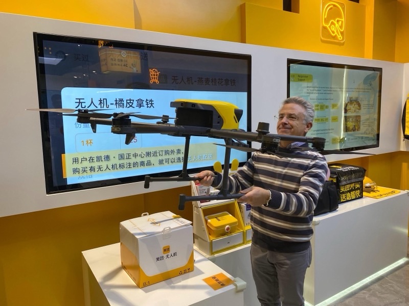 Benedetto Conversano with a delivery drone on display in China